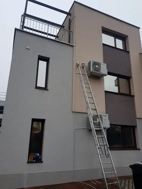 Lucru la înălțime, pe fațadă